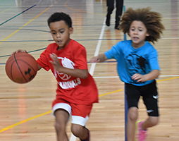 Kid's Playing Basketball